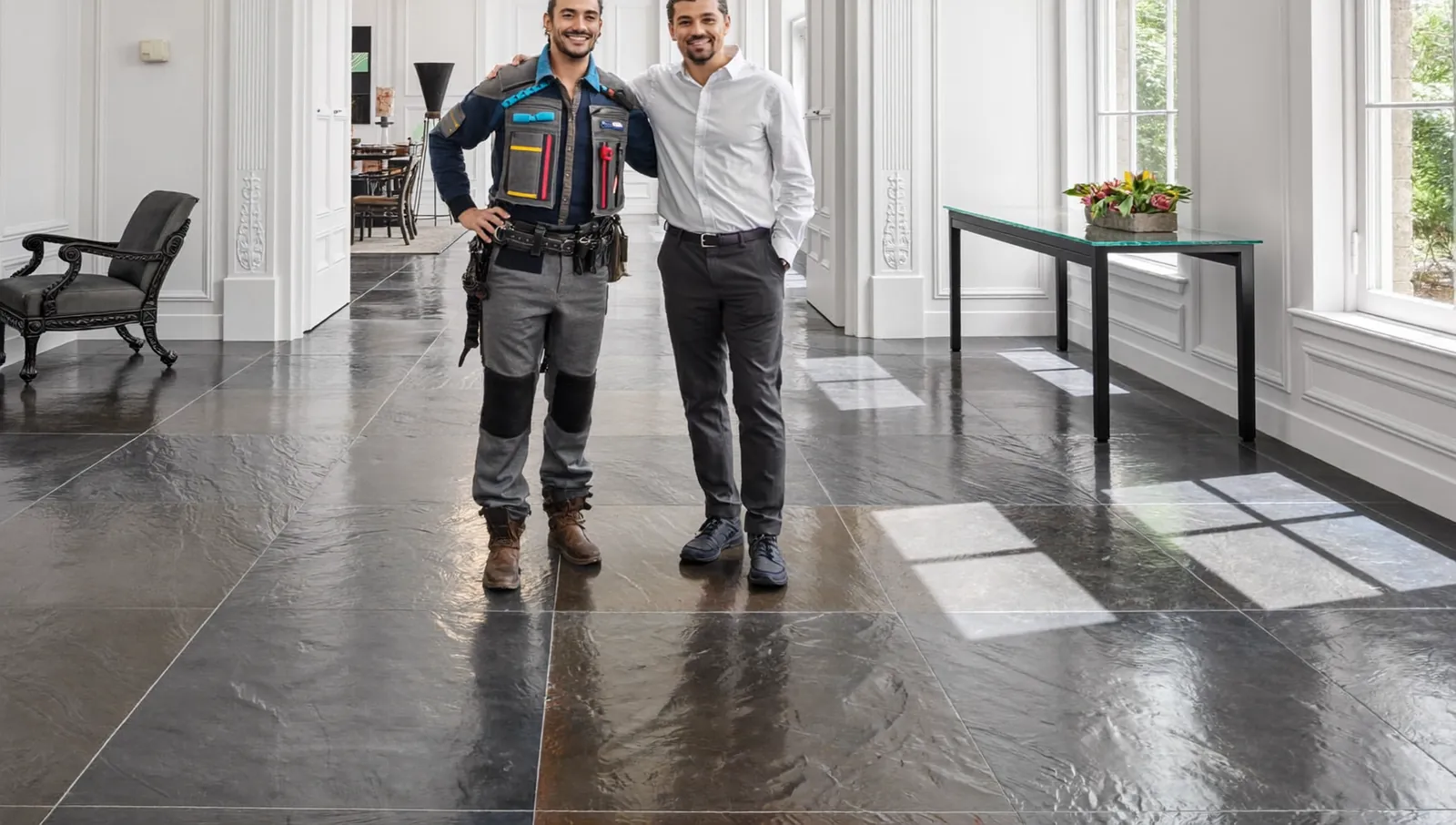 Customer viewing a professionally restored slate floor