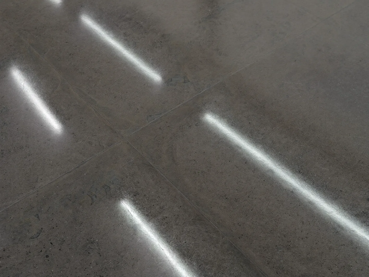 Close-up of a professionally polished concrete floor finish in London